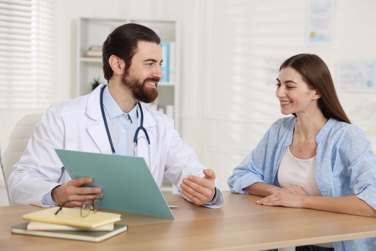 Doctor discussing HRT in Castle Rock, CO
